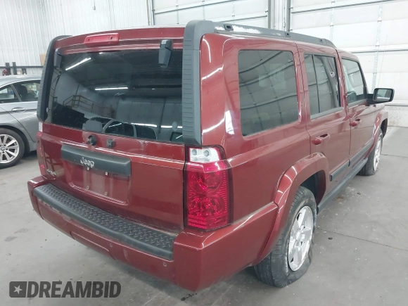 2007 Jeep Commander Sport with VIN 1J8HG48K97C518217, listed as a IAAI auction lot 42124862 with 198,371 mi miles. Bid and sale history available at carsss.com. Image 4.