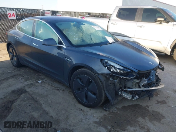 2018 Tesla Model 3 Long Range Battery with VIN 5YJ3E1EB0JF170215, listed as a IAAI auction lot 41969004 with 81,704 mi miles and . Bid and sale history available at DreamBid. Image 1.