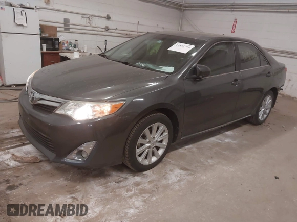 2013 Toyota Camry L with VIN 4T1BF1FK0DU644517, listed as a IAAI auction lot 41853704 with 144,490 mi miles. Bid and sale history available at carsss.com. Image 2.