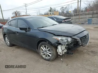 2016 Mazda 3 i Touring with VIN 3MZBM1V75GM311503, listed as a IAAI auction lot 41882706 with 131,123 mi miles. Bid and sale history available at carsss.com. Image 1.