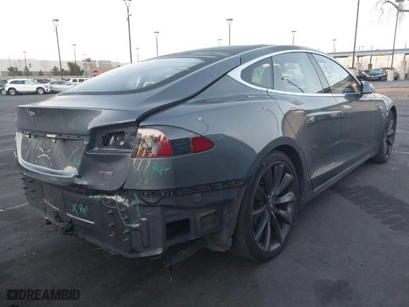 2013 Tesla Model S Performance with VIN 5YJSA1DP8DFP14078, listed as a IAAI auction lot 41728062 with 178,723 mi miles. Bid and sale history available at carsss.com. Image 4.