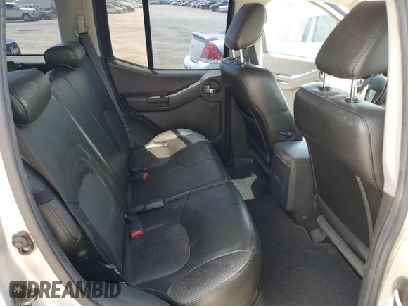 2010 Nissan Xterra S with VIN 5N1AN0NU2AC519838, listed as a Copart auction lot 57301355 with 129,990 mi miles and Salvage title. Bid and sale history available at DreamBid. Image 11.