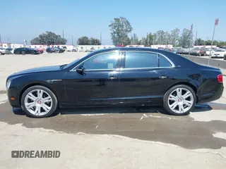 2017 Bentley Flying Spur z VIN SCBEH9ZA5HC063140, wystawiony jako IAAI lot #42120298 z przebiegiem 40 242 mil mil oraz . Historia ofert i sprzedaży dostępna na DreamBid. Obrazek 14.