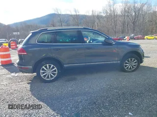 2016 Volkswagen Touareg Sport with VIN WVGEF9BP2GD005315, listed as a IAAI auction lot 41588590 with 134,709 mi miles and . Bid and sale history available at DreamBid. Image 13.
