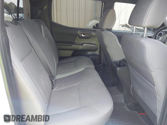 2023 Toyota Tacoma SR with VIN 3TMCZ5AN7PM639378, listed as a IAAI auction lot 42222407 with 38,172 mi miles and . Bid and sale history available at DreamBid. Image 8.