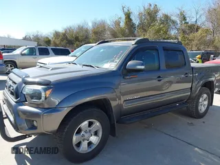 2014 Toyota Tacoma PreRunner with VIN 5TFJU4GN3EX057731, listed as a IAAI auction lot 41703750 with 110,321 mi miles. Bid and sale history available at carsss.com. Image 14.