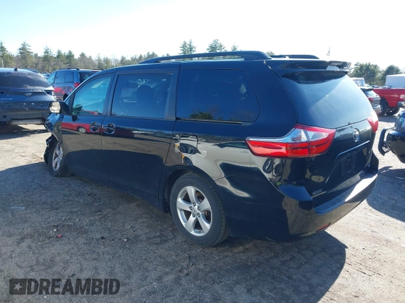 2015 Toyota Sienna LE AAS with VIN 5TDKK3DCXFS594370, listed as a IAAI auction lot 41910126 with 131,638 mi miles. Bid and sale history available at carsss.com. Image 3.