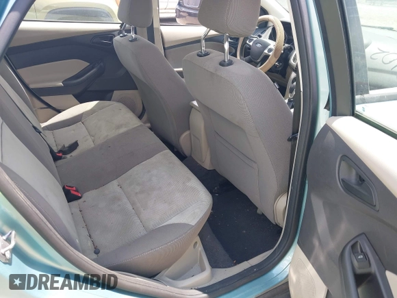 2012 Ford Focus SE with VIN 1FAHP3F2XCL240934, listed as a IAAI auction lot 42673102 with 188,658 mi miles and . Bid and sale history available at DreamBid. Image 8.