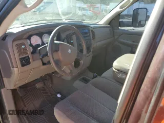 2005 Dodge Ram 2500 SLT with VIN 3D7KS28C05G701451, listed as a Copart auction lot 76239114 with 318,764 mi miles and Salvage Title. Bid and sale history available at carsss.com. Image 7.
