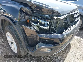 2018 Volkswagen Atlas SE with VIN 1V2DR2CA1JC546005, listed as a IAAI auction lot 41724133 with 116,633 mi miles and . Bid and sale history available at DreamBid. Image 6.