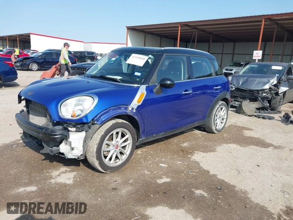 2015 MINI Countryman with VIN WMWZB3C56FWR43443, listed as a IAAI auction lot 41920848 with 91,192 mi miles and . Bid and sale history available at DreamBid. Image 18.