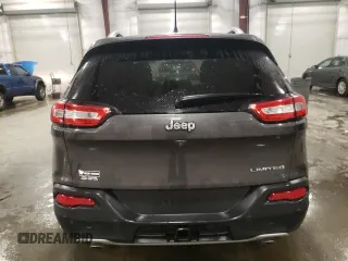 2014 Jeep Cherokee Limited with VIN 1C4PJLDS9EW241374, listed as a Copart auction lot 61048025 with 77,697 mi miles and Salvage title. Bid and sale history available at DreamBid. Image 6.