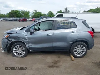 2020 Chevrolet Trax Premier with VIN 3GNCJRSB2LL140689, listed as a IAAI auction lot 42212724 with 73,701 mi miles and . Bid and sale history available at DreamBid. Image 13.