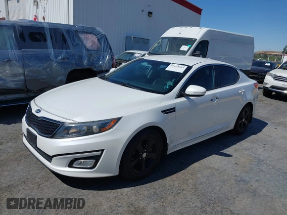 2015 Kia Optima LX z VIN KNAGM4A7XF5528918, wystawiony jako IAAI lot #42673801 z przebiegiem 132 968 mil mil oraz . Historia ofert i sprzedaży dostępna na DreamBid. Obrazek 2.