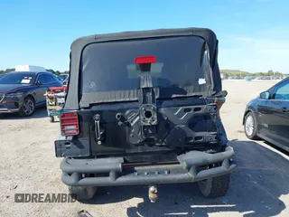 2016 Jeep Wrangler Willys Wheeler z VIN 1C4AJWAG9GL257621, wystawiony jako IAAI lot #41432306 z przebiegiem 84 248 mil mil oraz . Historia ofert i sprzedaży dostępna na DreamBid. Obrazek 16.