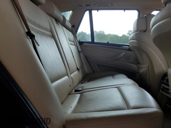 2012 BMW X5 35i with VIN 5UXZV4C54CL990112, listed as a Copart auction lot 59125245 with 142,742 mi miles and Clean title. Bid and sale history available at DreamBid. Image 11.