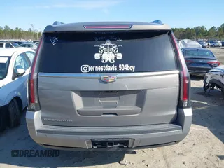 2018 Cadillac Escalade Luxury z VIN 1GYS3BKJ8JR378155, wystawiony jako IAAI lot #41735073 z przebiegiem 97 739 mil mil oraz . Historia ofert i sprzedaży dostępna na DreamBid. Obrazek 16.