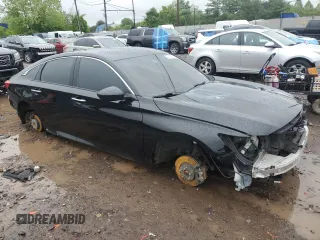 2018 Honda Accord Touring z VIN 1HGCV2F95JA029717, wystawiony jako Copart lot #56161585 z przebiegiem 128 576 mil mil oraz Szkoda całkowita • Salvage title. Historia ofert i sprzedaży dostępna na DreamBid. Obrazek 4.