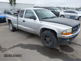 2003 Dodge Dakota SLT with VIN 1D7HL42X83S269082, listed as a IAAI auction lot 41890813 with 1 mi miles. Bid and sale history available at carsss.com. Image 1.