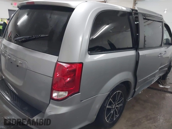 2015 Dodge Grand Caravan SE with VIN 2C4RDGBG9FR703691, listed as a IAAI auction lot 41395564 with 170,735 mi miles and . Bid and sale history available at DreamBid. Image 20.