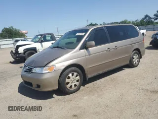 2004 Honda Odyssey EX-L z VIN 5FNRL18944B025529, wystawiony jako Copart lot #57322735 z przebiegiem 187 095 mil mil oraz Szkoda całkowita • Salvage title. Historia ofert i sprzedaży dostępna na DreamBid. Obrazek 1.