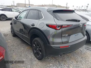 2024 Mazda CX-30 Premium Plus with VIN 3MVDMBEY1RM720111, listed as a IAAI auction lot 42730412 with 3,988 mi miles and . Bid and sale history available at DreamBid. Image 3.