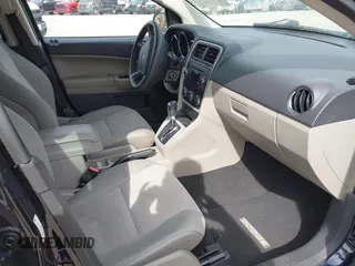 2011 Dodge Caliber Mainstreet with VIN 1B3CB3HA6BD121439, listed as a IAAI auction lot 42131091 with 92,850 mi miles. Bid and sale history available at carsss.com. Image 5.