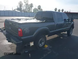 2015 Ford Super Duty F-250 SRW Lariat with VIN 1FT7W2BT9FEC45987, listed as a IAAI auction lot 41814095 with 112,806 mi miles. Bid and sale history available at carsss.com. Image 4.
