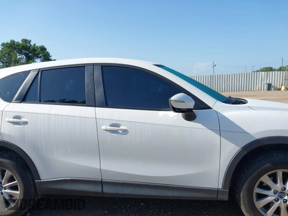 2015 Mazda CX-5 Sport with VIN JM3KE2BE6F0541469, listed as a IAAI auction lot 42632906 with 166,257 mi miles and . Bid and sale history available at DreamBid. Image 13.