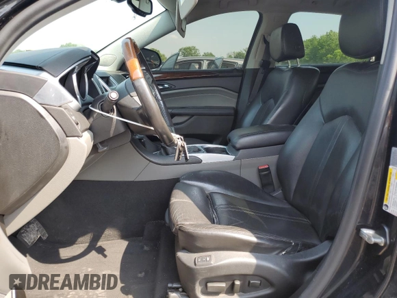 2011 Cadillac SRX Premium Collection z VIN 3GYFNFEY9BS606335, wystawiony jako Copart lot #59009285 z przebiegiem 152 828 mil mil oraz Szkoda całkowita • Salvage title. Historia ofert i sprzedaży dostępna na DreamBid. Obrazek 7.