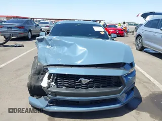2024 Ford Mustang EcoBoost with VIN 1FA6P8THXR5140195, listed as a IAAI auction lot 42268566 with 11,032 mi miles and . Bid and sale history available at DreamBid. Image 13.