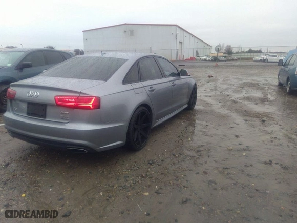 2016 Audi A6 3.0T Premium Plus with VIN WAUFGAFC6GN177739, listed as a IAAI auction lot 41013262 with 89,865 mi miles. Bid and sale history available at carsss.com. Image 4.