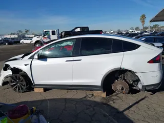 2022 Tesla Model X with VIN 7SAXCBE56NF329657, listed as a IAAI auction lot 41400629 with Not Provided miles and . Bid and sale history available at DreamBid. Image 15.