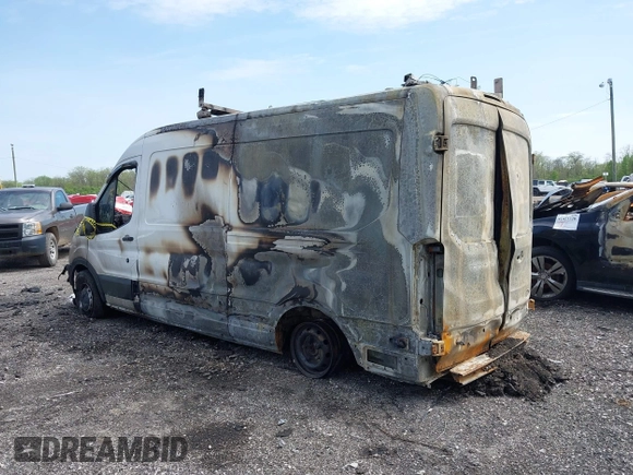 2015 Ford Transit Cargo with VIN 1FTNR2CG5FKA99184, listed as a IAAI auction lot 42143175 with Not provided miles and . Bid and sale history available at DreamBid. Image 3.