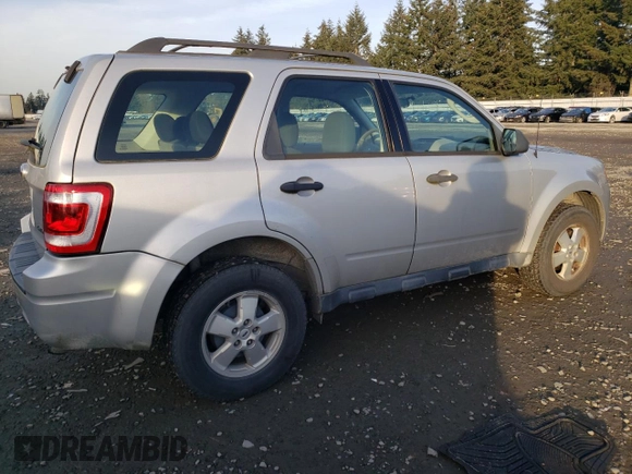 2009 Ford Escape XLS with VIN 1FMCU92709KD07634, listed as a Copart auction lot 42264585 with 155,108 mi miles and Clean title. Bid and sale history available at DreamBid. Image 3.