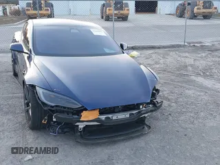 2023 Tesla Model S with VIN 5YJSA1E53PF518986, listed as a IAAI auction lot 41223046 with 22,204 mi miles and . Bid and sale history available at DreamBid. Image 13.