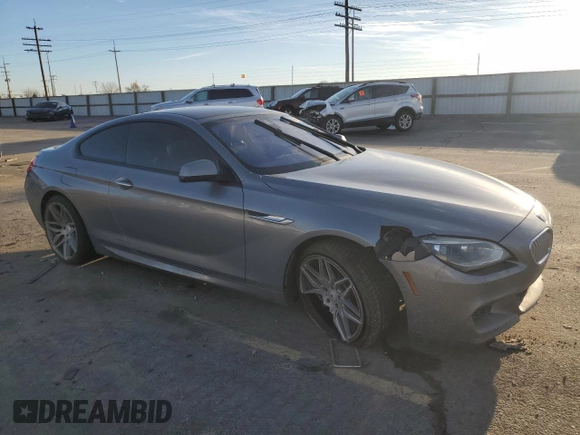 2015 BMW 6 Series 650i with VIN WBAYM9C53FD248356, listed as a Copart auction lot 85499554 with 115,292 mi miles and Salvage Title. Bid and sale history available at DreamBid. Image 4.