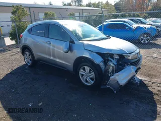 2020 Honda HR-V EX with VIN 3CZRU6H5XLM702577, listed as a IAAI auction lot 40836982 with 18,615 mi miles. Bid and sale history available at carsss.com. Image 1.