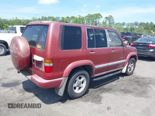 1998 Isuzu Trooper S with VIN JACDJ58XXW7916695, listed as a IAAI auction lot 42135639 with 254,186 mi miles and . Bid and sale history available at DreamBid. Image 4.