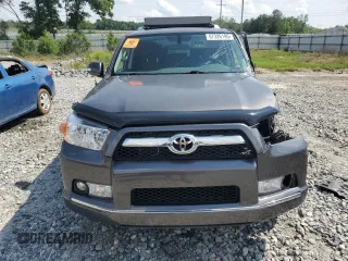 2013 Toyota 4Runner SR5 z VIN JTEZU5JR1D5062064, wystawiony jako Copart lot #57326195 z przebiegiem 176 073 mil mil oraz Szkoda całkowita • Salvage title. Historia ofert i sprzedaży dostępna na DreamBid. Obrazek 5.