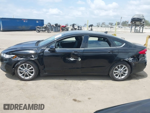 2020 Ford Fusion SE z VIN 3FA6P0LU7LR170922, wystawiony jako IAAI lot #42121025 z przebiegiem 115 799 mil mil oraz . Historia ofert i sprzedaży dostępna na DreamBid. Obrazek 14.