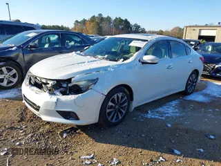 2016 Nissan Altima SV with VIN 1N4AL3AP1GC191838, listed as a IAAI auction lot 40991495 with 206,581 mi miles and . Bid and sale history available at DreamBid. Image 2.