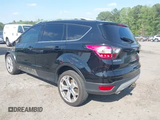2017 Ford Escape Titanium with VIN 1FMCU0J91HUA75417, listed as a IAAI auction lot 42044170 with 116,431 mi miles. Bid and sale history available at carsss.com. Image 3.