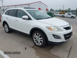 2012 Mazda CX-9 Grand Touring with VIN JM3TB2DA3C0354645, listed as a IAAI auction lot 42447164 with 212,014 mi miles and . Bid and sale history available at DreamBid. Image 1.