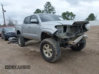 2017 Toyota Tacoma SR with VIN 5TFAX5GN0HX083950, listed as a IAAI auction lot 41519388 with 130,211 mi miles. Bid and sale history available at carsss.com. Image 1.