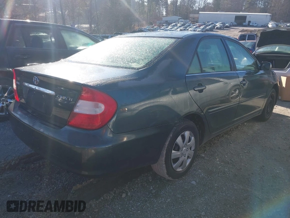 2003 Toyota Camry LE with VIN 4T1BE32KX3U689421, listed as a IAAI auction lot 41566812 with 192,673 mi miles and . Bid and sale history available at DreamBid. Image 4.