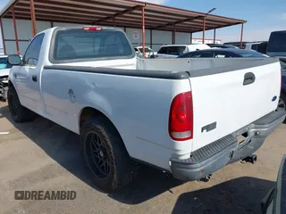 2004 Ford F-150 XL with VIN 2FTRF17WX4CA74272, listed as a IAAI auction lot 42657638 with 119,928 mi miles and . Bid and sale history available at DreamBid. Image 3.