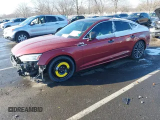 2018 Audi A5 Sportback Prestige z VIN WAUCNCF5XJA052165, wystawiony jako IAAI lot #41321114 z przebiegiem 62 648 mil mil oraz . Historia ofert i sprzedaży dostępna na DreamBid. Obrazek 2.