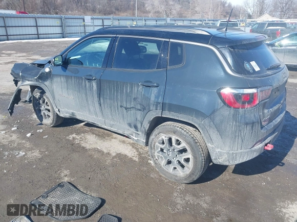 2018 Jeep Compass Trailhawk with VIN 3C4NJDDB5JT458112, listed as a IAAI auction lot 41617567 with 79,612 mi miles and . Bid and sale history available at carsss.com. Image 3.