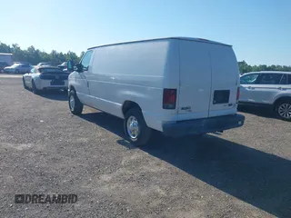 2011 Ford Econoline Cargo Commercial with VIN 1FTNE1EWXBDB18935, listed as a IAAI auction lot 42269977 with 240,545 mi miles and . Bid and sale history available at DreamBid. Image 3.